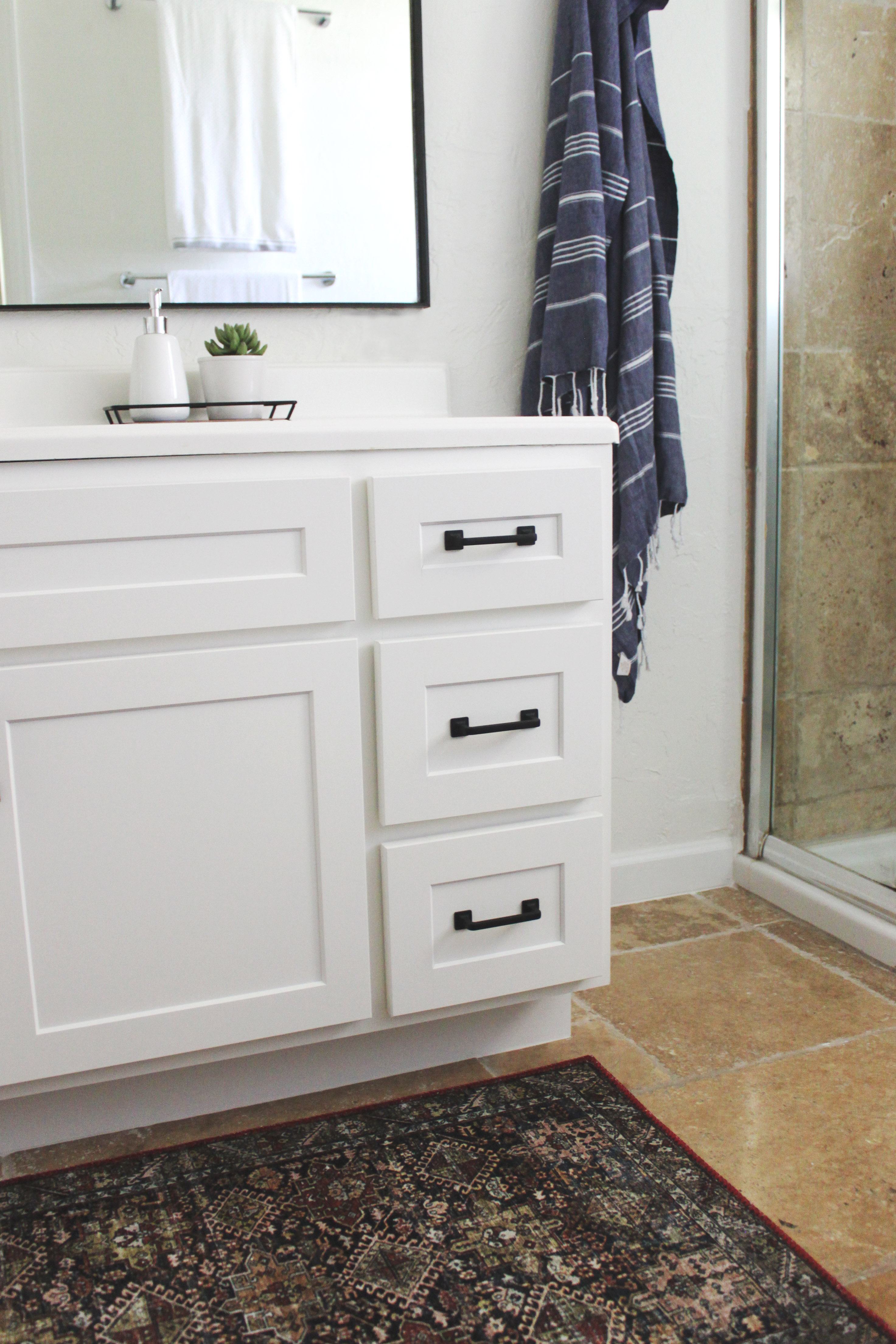 Read more about the article Bathroom Reveal: travertine trials